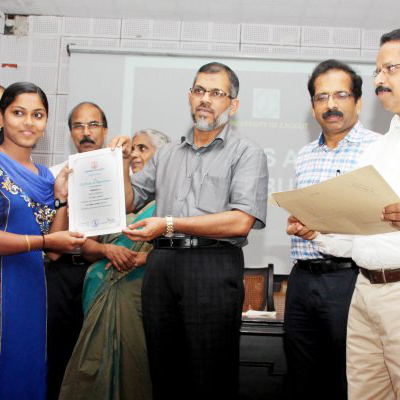 Sreekala.A (II MA English) receiving the certificate for First Rank from The Vice Chancellor of the University of Calicut, 2015.